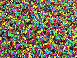 Background template made out of small bright and colorful small stones and pebbles photo