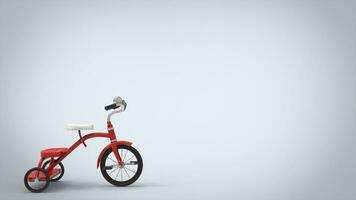 Vintage red tricycle - white background photo