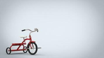 Pretty vintage red tricycle - white background photo