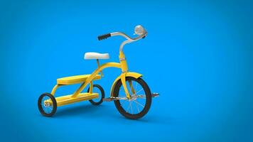 Beautiful vintage yellow tricycle - blue background photo