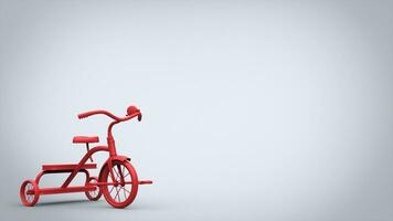 Beautiful red toy tricycle photo