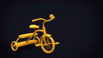 Beautiful vintage yellow toy tricycle on black background photo