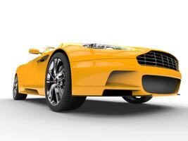 Yellow sports car - low view closeup photo