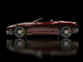 Dark red metallic convertible sports car photo