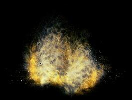 Gold particles - isolated on black background photo