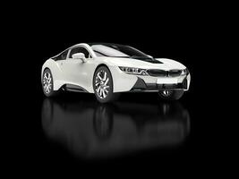 Modern white sports car - isolated on black reflective background. photo