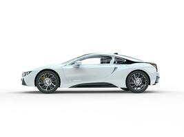 Modern white sports car - side view - isolated on white background. photo