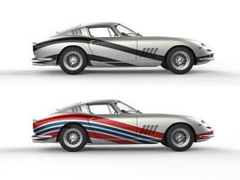 Silver vintage sports cars with racing stripes - side view - isolated on white background photo