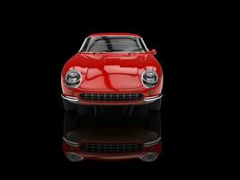 Red classic sports car - front view - isolated on black reflective background photo