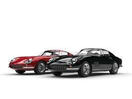 Black and dark red vintage sports cars - isolated on white background photo