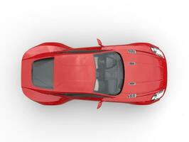 Red sports car - top view - isolated on white background photo