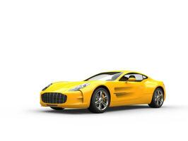 Yellow sports car - beauty studio shot - isolated on white background photo