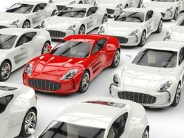 Stylish red sports car stands out in the crowd of generic white cars photo