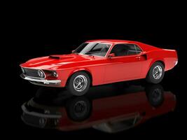 Cool red muscle car on black reflective background photo