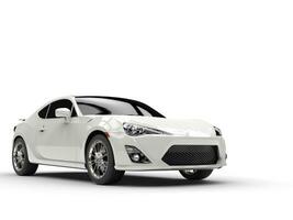 Generic white sports car - studio shot photo