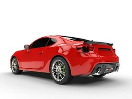 Generic red sports car - rear left view photo