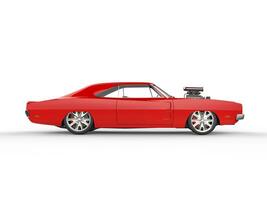 Vintage red muscle car - side view photo