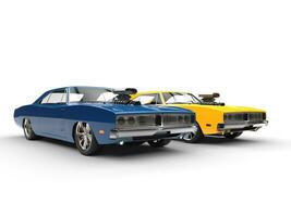 Blue and yellow vintage muscle cars photo