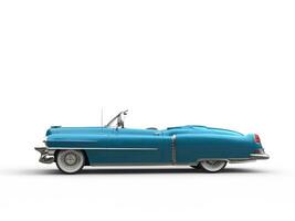 Cool vintage car - metallic blue - side view photo