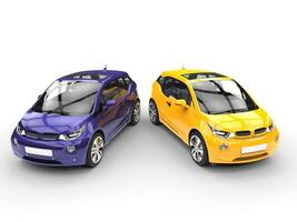 Purple and yellow small economic cars - top view photo