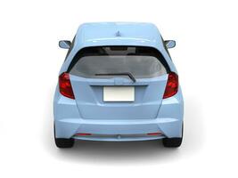 Bright blue modern compact car - back view photo