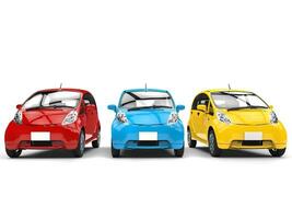 Economic compact electric cars in primary colors photo