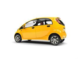 Sun yellow electric compact car - side rear view photo