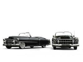 Two awesome black vintage cars - studio lighting shot photo