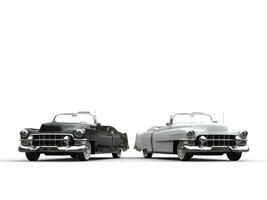 dos increíble negro y blanco Clásico carros - lado por lado foto