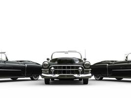 Awesome black vintage cars - front view closeup shot photo