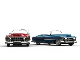 Metallic cherry and royalblue vintage cars - side by side photo