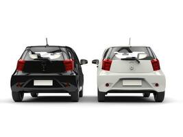 Cool black and white compact urban cars - back view photo