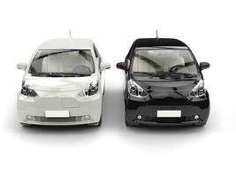 Cool black and white compact urban cars - front view photo