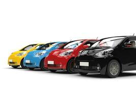 Row of cool urban modern compact cars - various colors photo