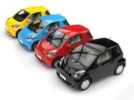 Row of cool urban modern compact cars - various colors - top view photo