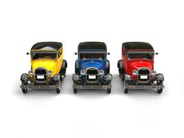 Beautiful 1920s vintage cars in primary colors - studio shot photo