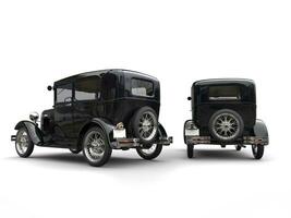 Two beautiful 1920s vintage cars - side by side - back view - 3D Illustration photo