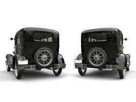 Two beautiful 1920s vintage cars - side by side - back view - 3D Illustration photo