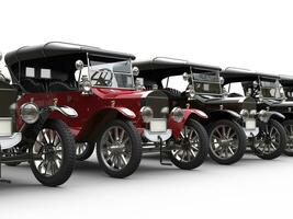 Vintage cars in a row - red stands out photo