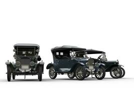 Three restored vintage cars side by side photo