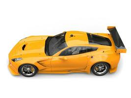 Sun yellow concept sports car - top down view photo