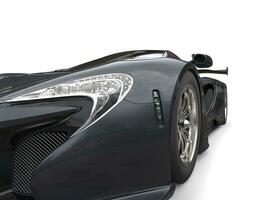 Black awesome sportscar - headlight extreme closeup shot photo