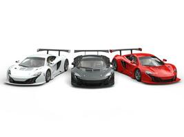 Beautiful modern supercars - red, black and white photo