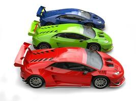 Racing cars in red, green and blue - top down side view photo