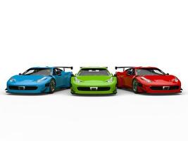 Red, green and blue modern luxury sportscars - front view photo