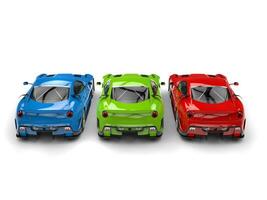 Fast sports cars in red, green and blue - back view photo