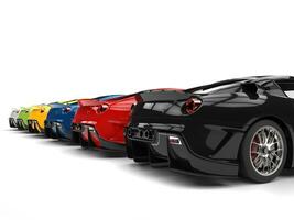 Row of great modern sports cars in various colors - back view photo