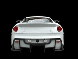 Clean white modern urban sports car - back view photo