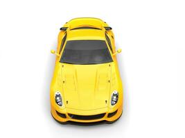 Sun yellow urban sports car - top front view photo