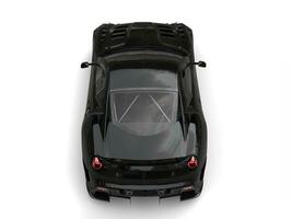 Jet black modern sports car - topdown view photo